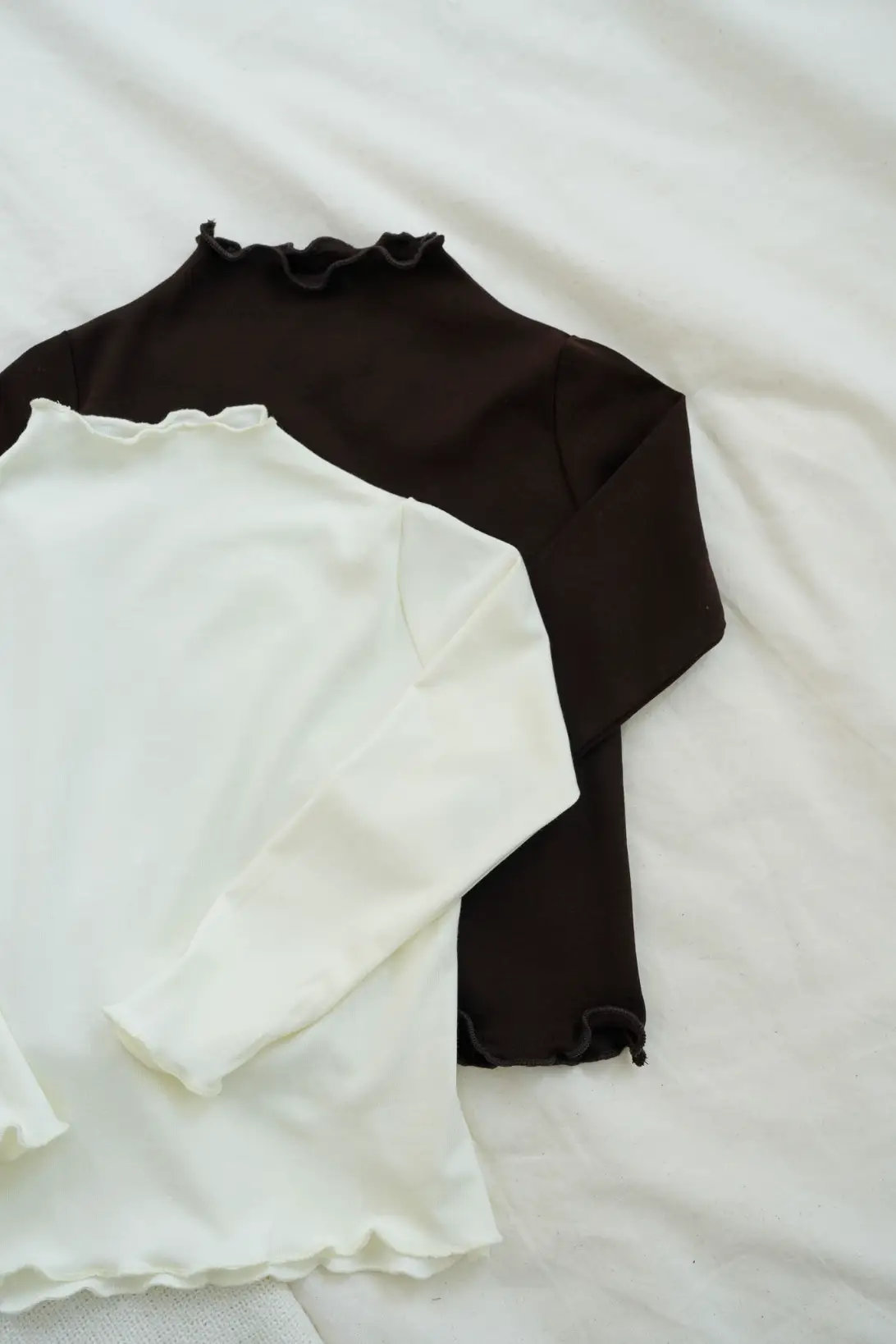 Cream cotton turtleneck for toddlers