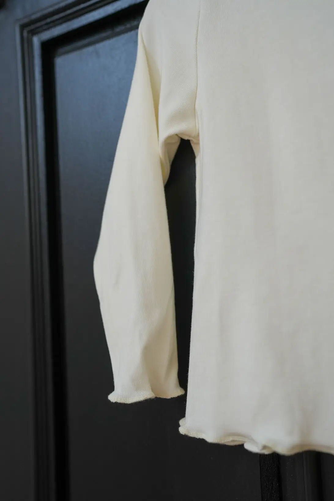 Cream cotton turtleneck for toddlers