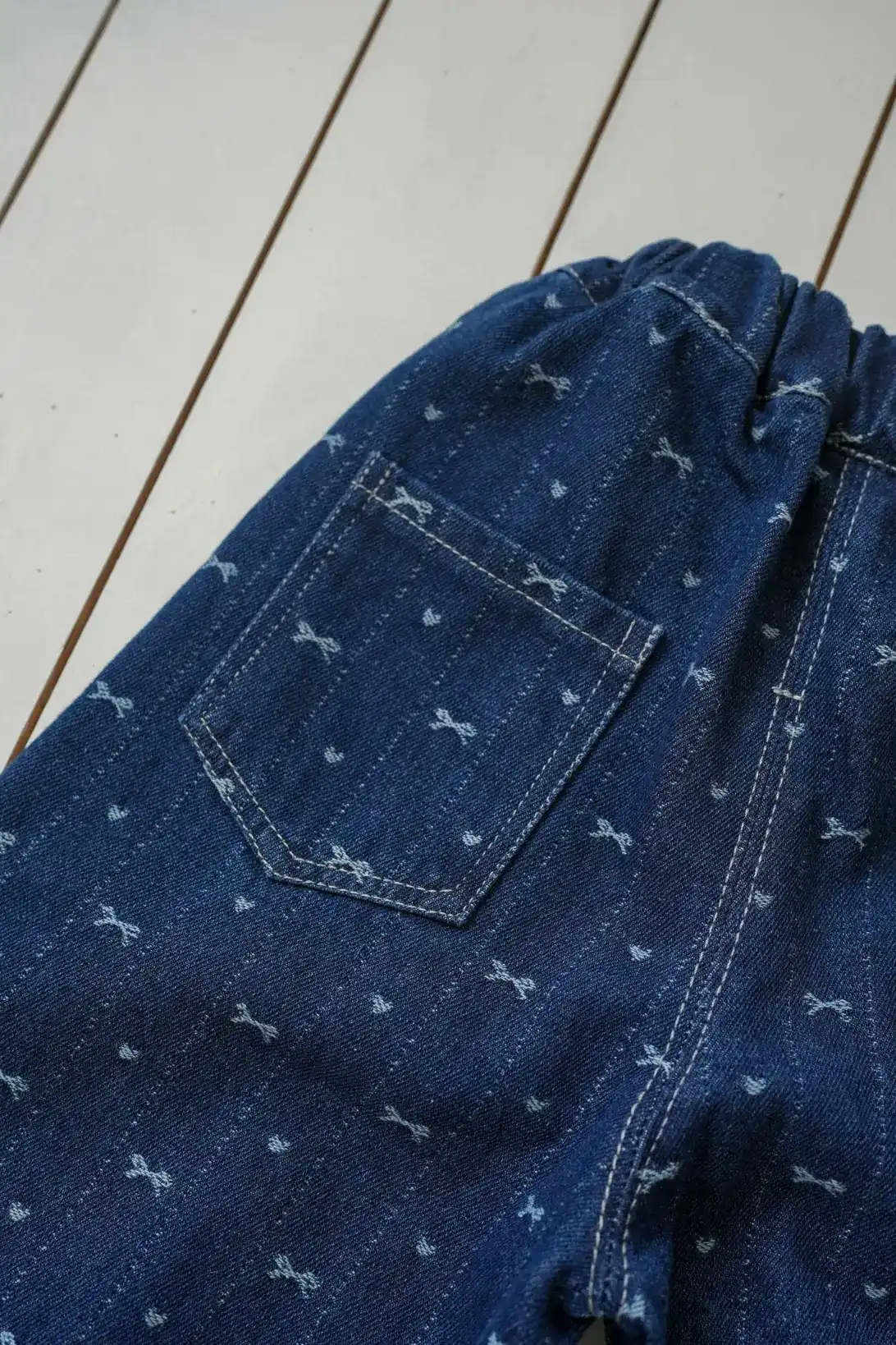 Bow Denim Jeans close-up with bow print