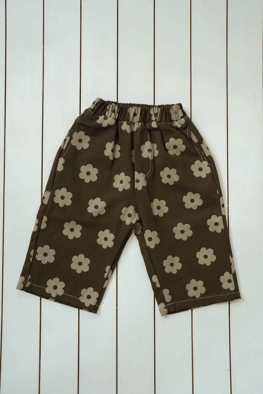 Brown Daisy Pants for kids with beige floral print and elasticated waist