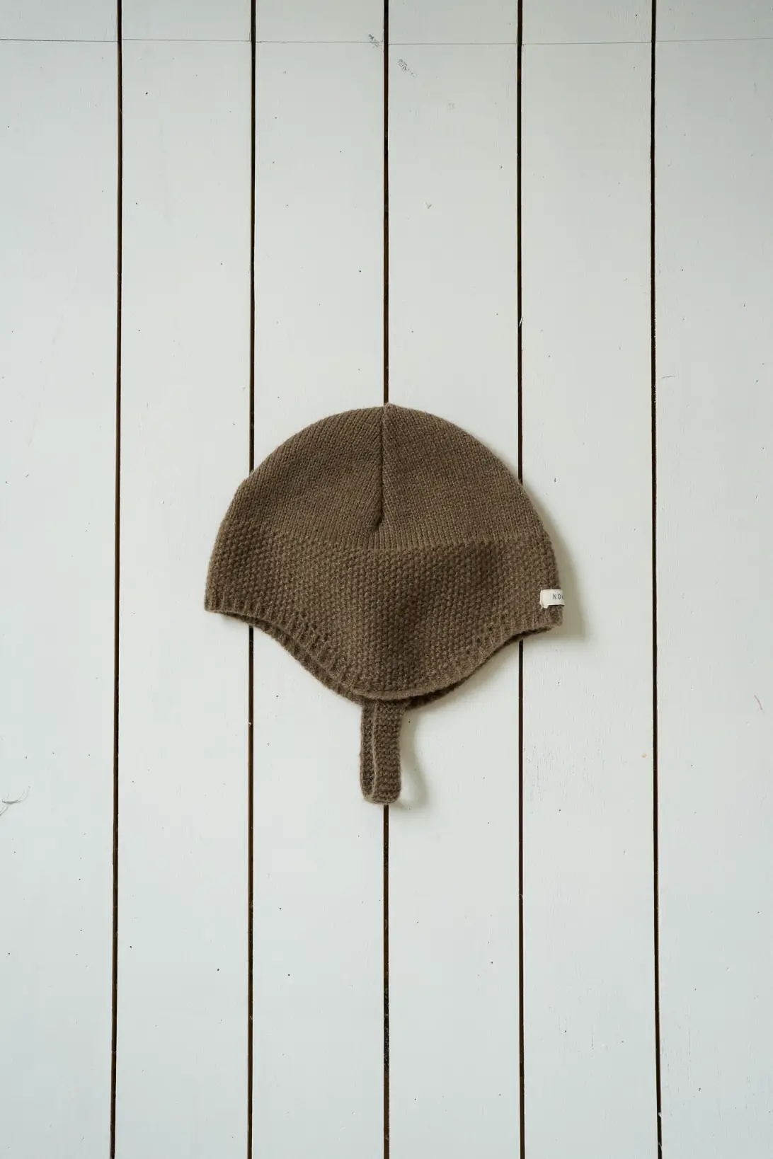 Brown Little Explorer baby knit hat with button fastening