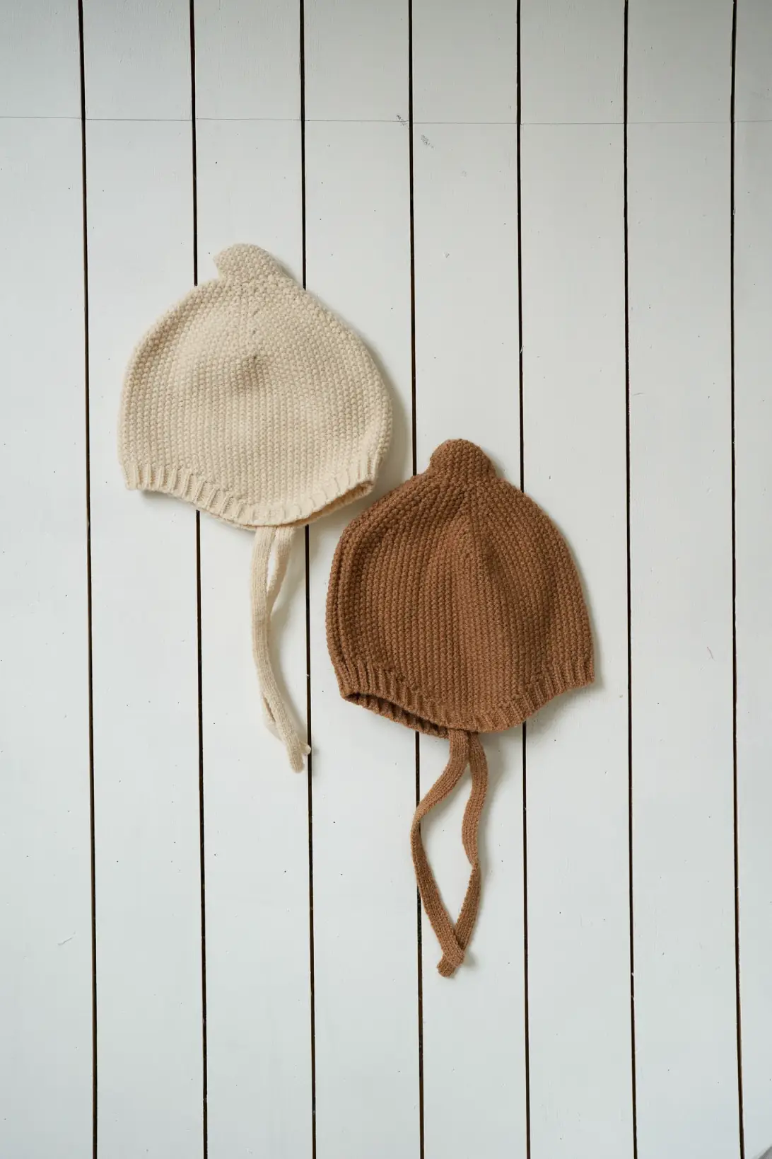 Cream and brown Acorn baby knit bonnets with tie straps
