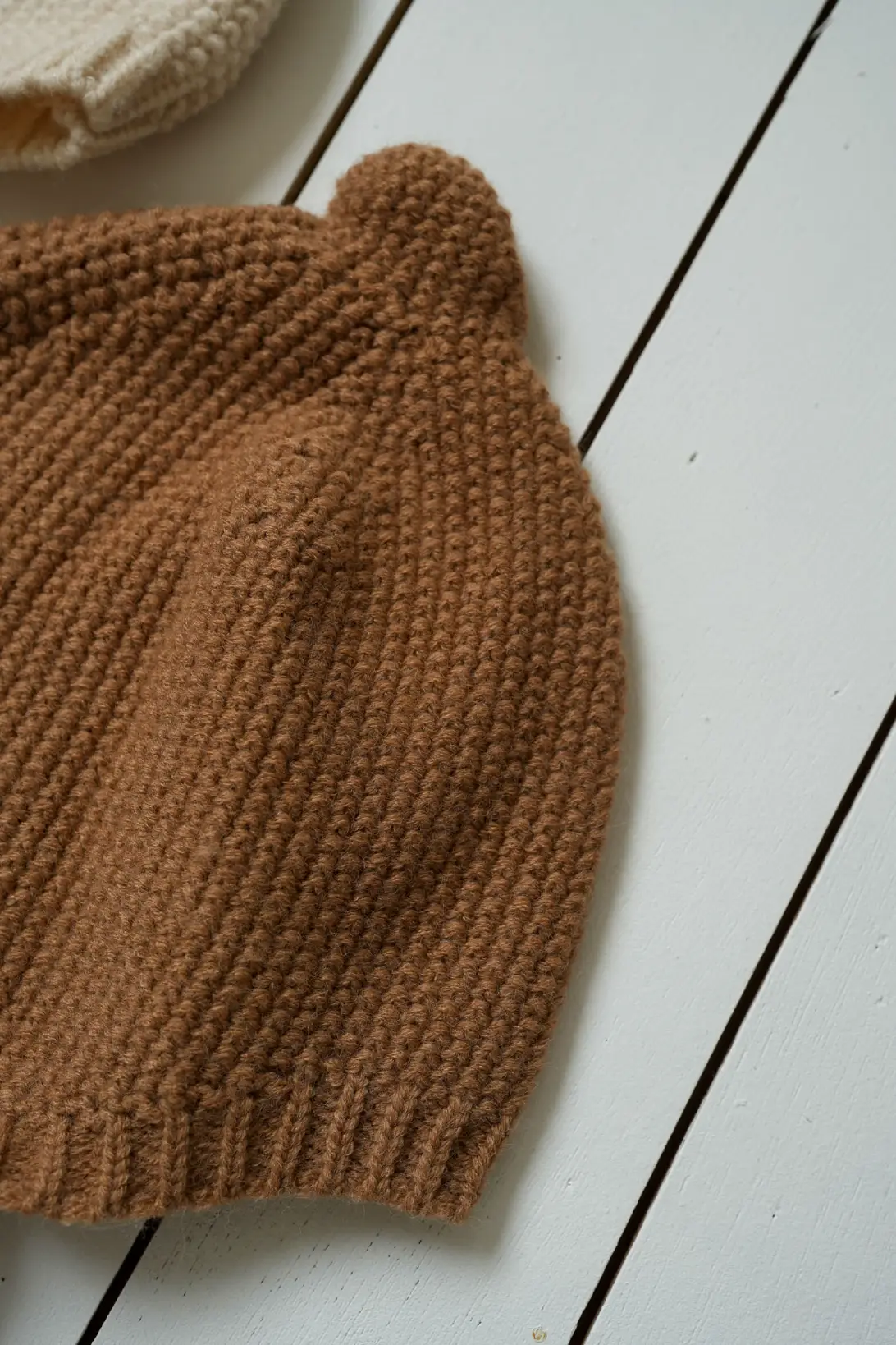 Cream and brown knitted Acorn bonnets for babies