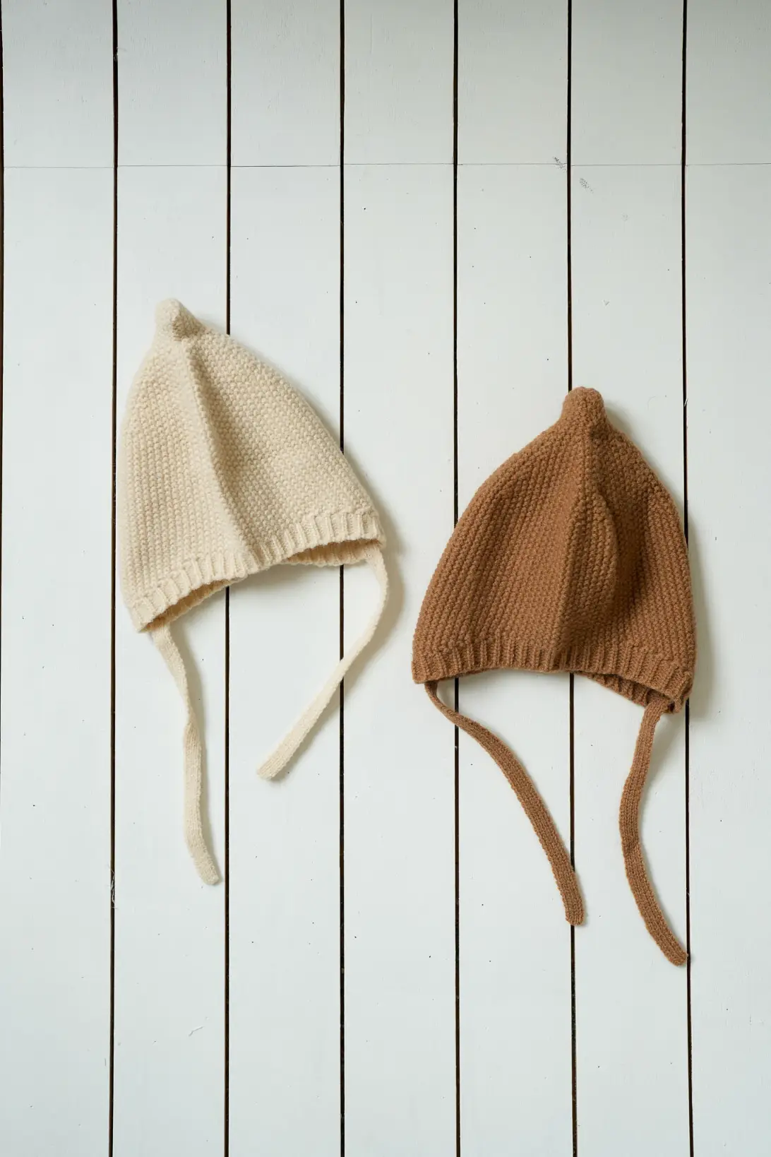 Cream and brown Acorn baby knit bonnets with tie straps