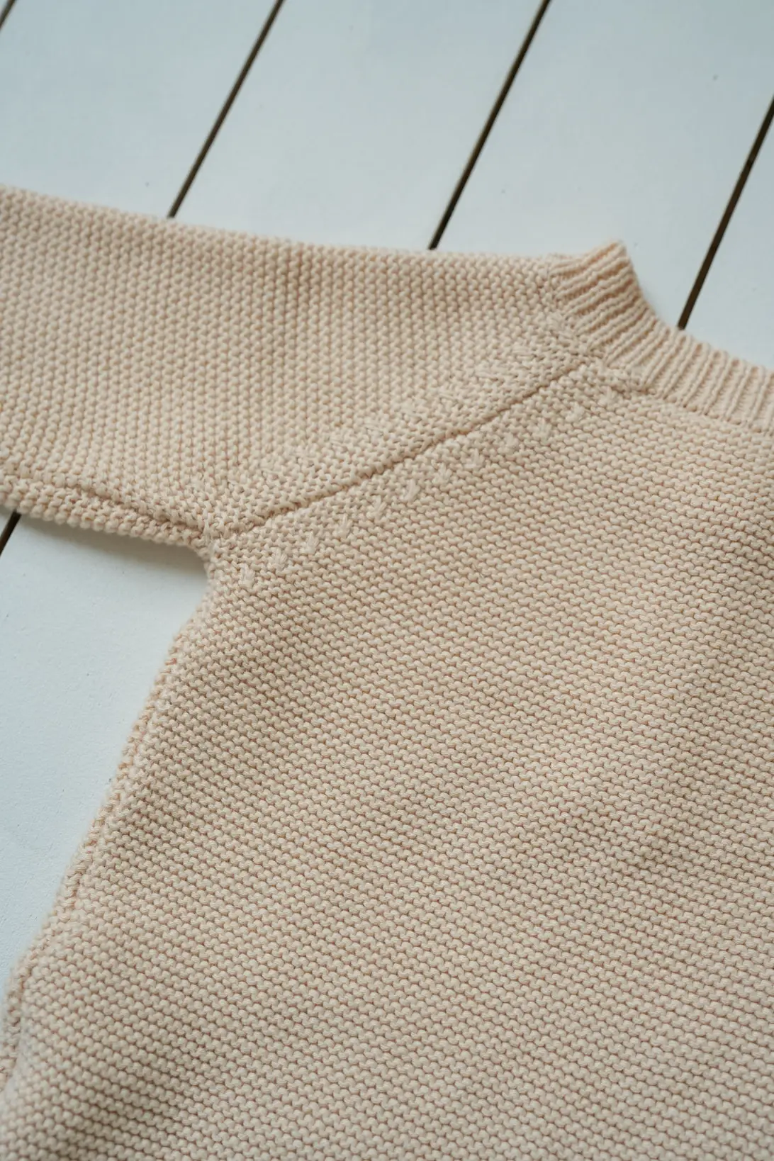 Little Nest 100% cotton knitted baby bodysuit in neutral colours