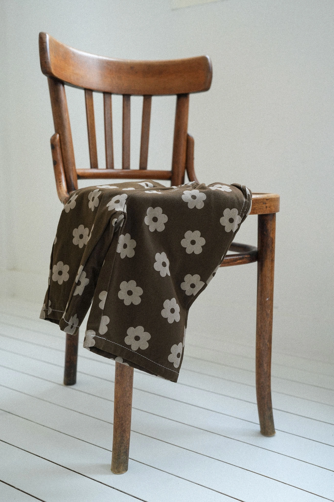 Brown Daisy Pants for kids with beige floral print and elasticated waist
